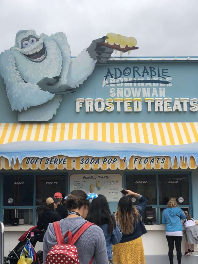 The storefront for Adorable Snowman Frosted Treats at PIXAR Pier in Disney California Adventure 