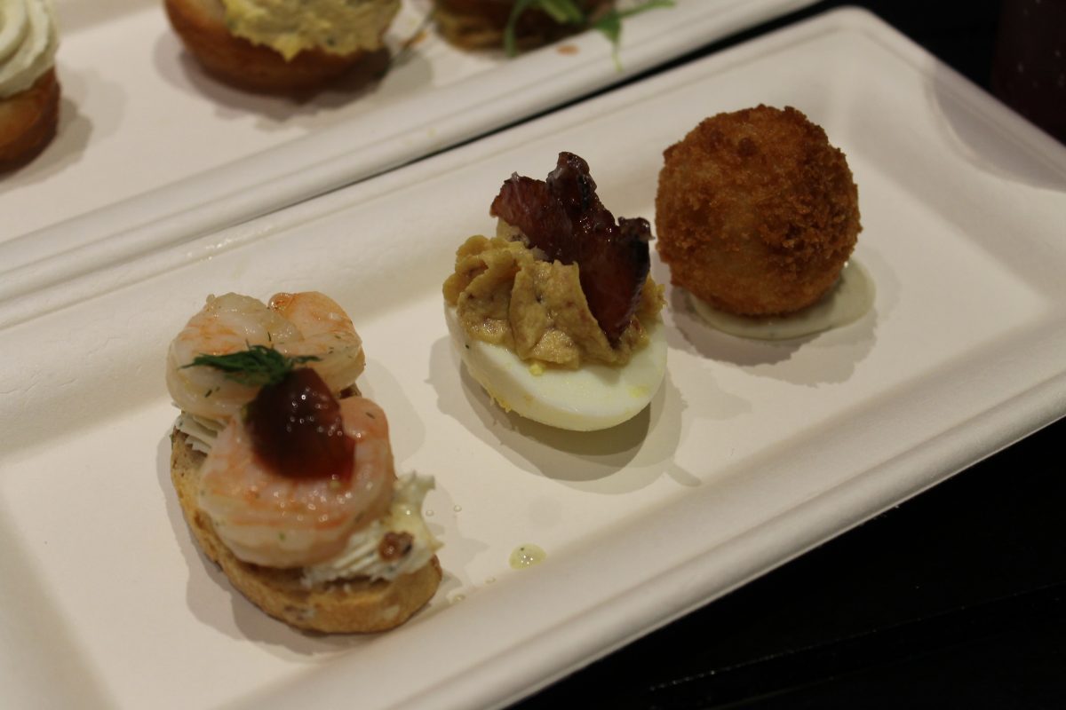 Gallery Bites: A Trio of Hors d’Oeuvres : , Chilled Shrimp with Cucumber Cream Cheese on a Crostini, Traditional Deviled Egg with Candied Bacon, Crispy Truffled Risotto Ball with Stone-ground Mustard - $7.00