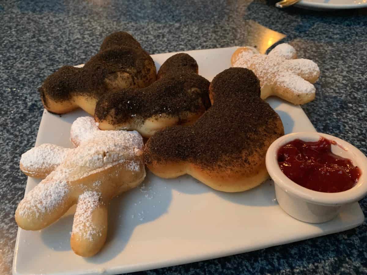 fried chicken and beignets and birthday cake mickey beignets cafe orleans disneyland park