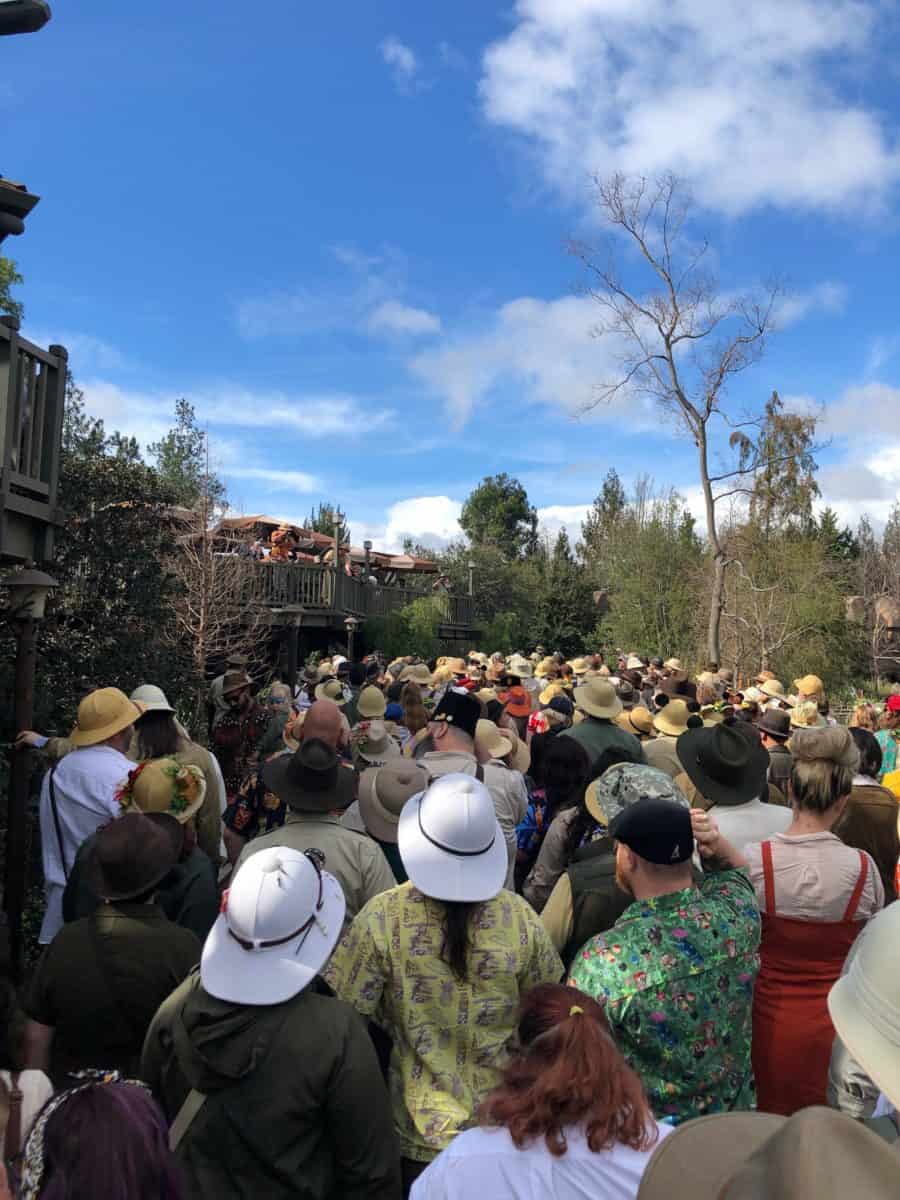 Over 600 Adventurelanders gathered for a group photo on the shores of the Rivers of America.
