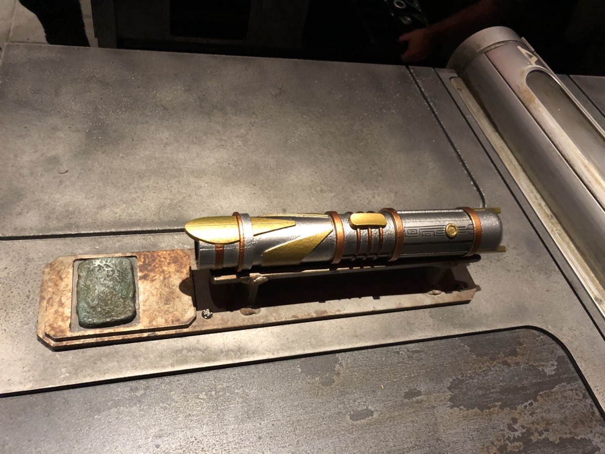 star wars galaxy's edge lightsaber workshop peace and justice electronic lightsaber