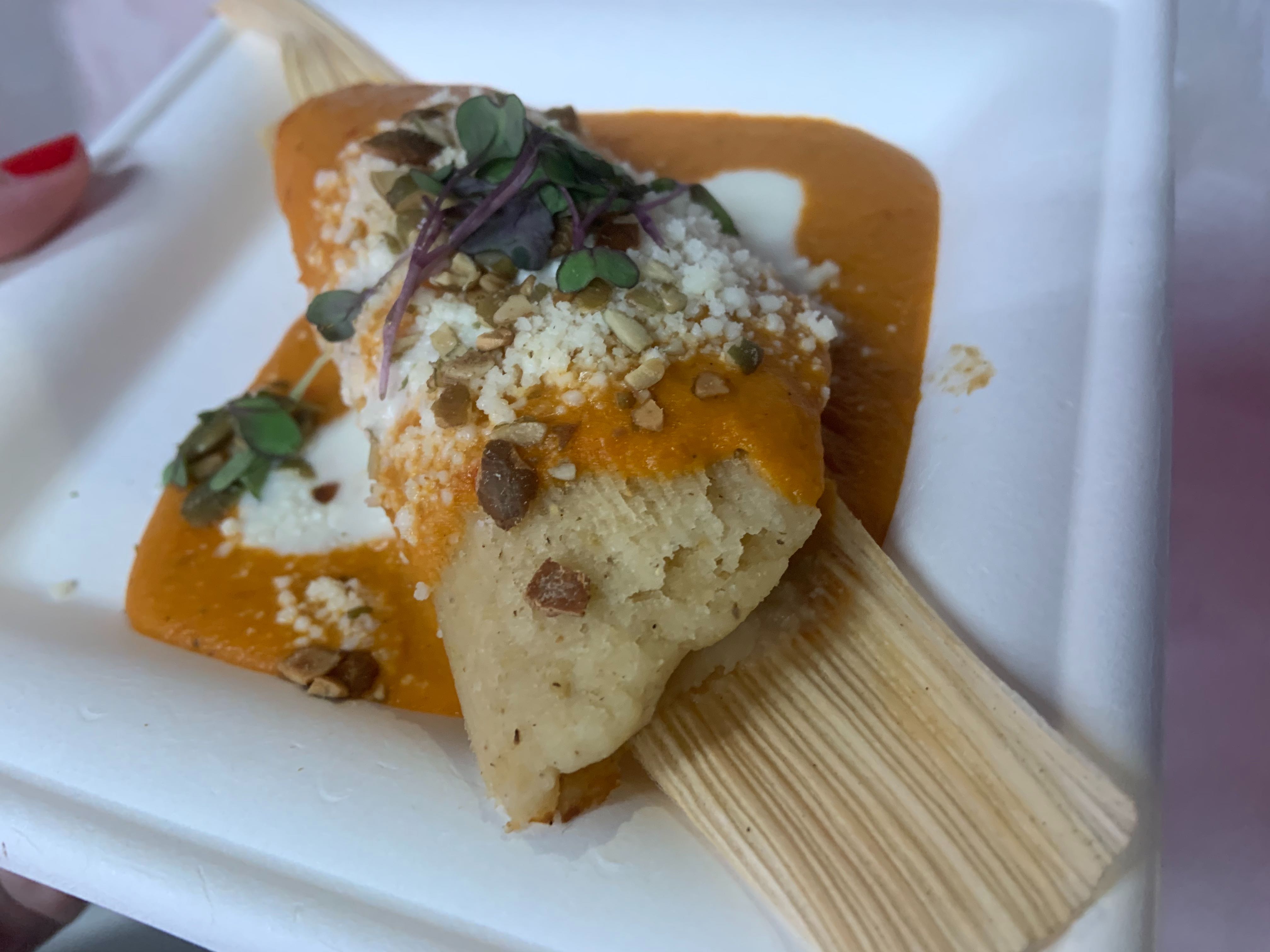 *NEW* Tamal de Pollo: Braised Chipotle Chicken served in a Corn Masa with Yellow Mole and topped with Toasted Pumpkin Seeds, Queso Cotija and Crema Mexicana – $6.75