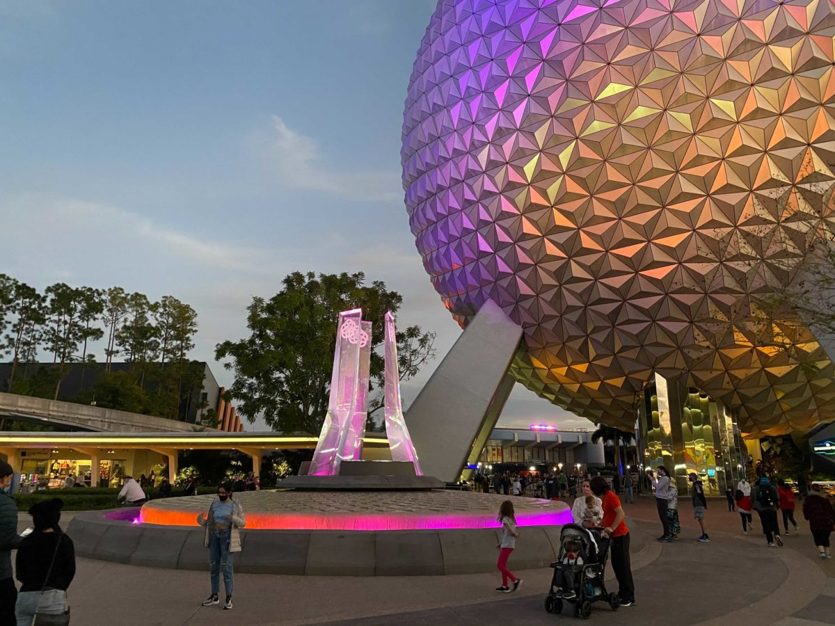 photos of building lit up during illuminations epcot