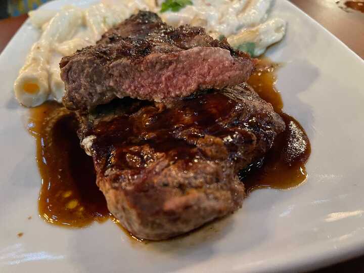 mama-melroses-ristorante-italiano-charred-strip-steak-10-8698427