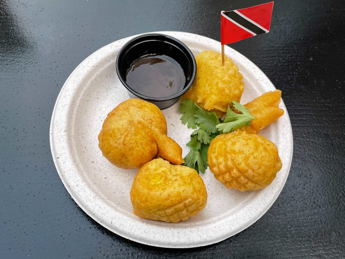 Review Trinidad And Tobago Tasting Booth Serves Tasteless Pholourie And Uninspired Pineapple Skewers For Mardi Gras 21 International Flavors Of Carnaval At Universal Studios Florida Wdw News Today