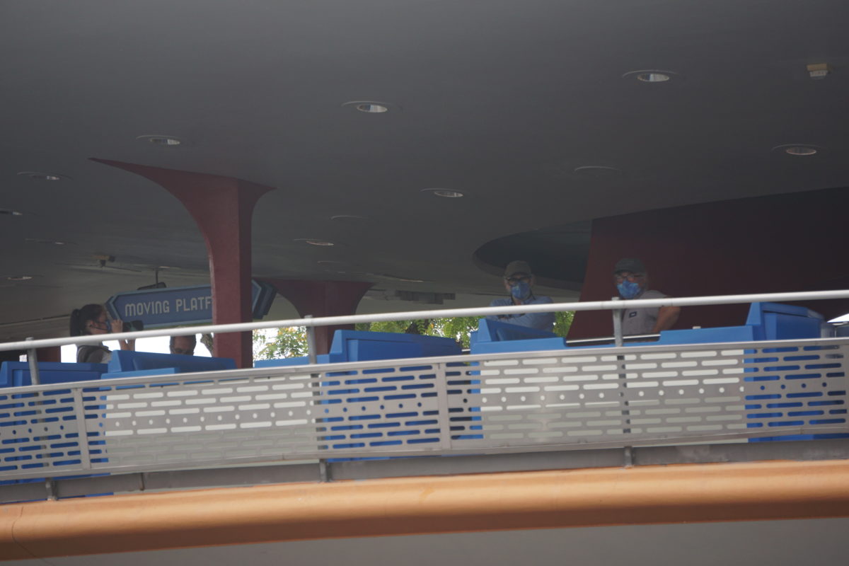 peoplemover-cast-members-repairmen-on-platform-magic-kingdom-04212021-4351350