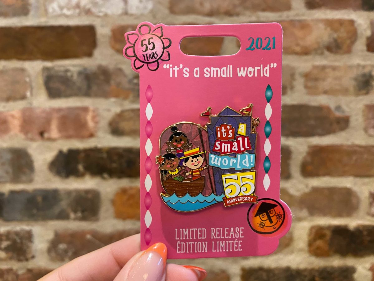 limited edition "it's a small world" pin celebrating 55 years of the ride