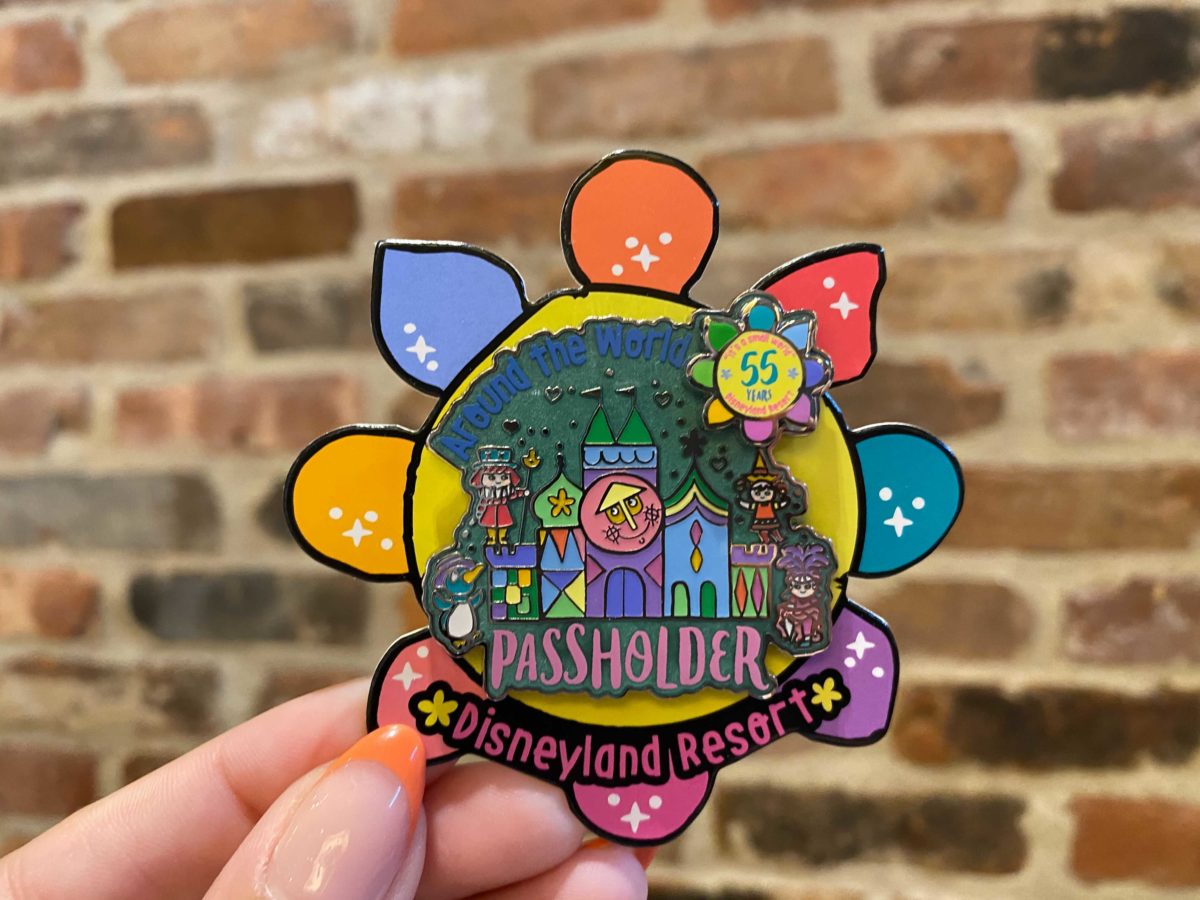 limited edition "it's a small world" pin celebrating 55 years of the ride