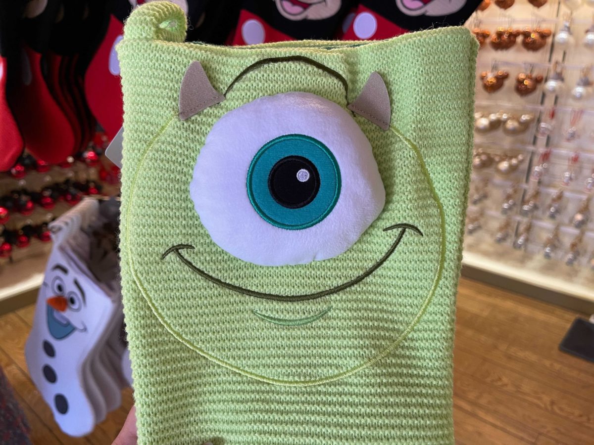 New Monsters, Inc. stockings featuring Mike Wazowski at Ye Olde Christmas Shoppe in Magic Kingdom at Walt Disney World