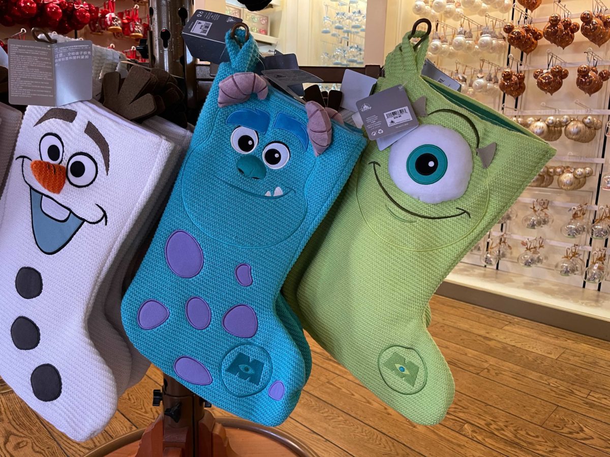 New Monsters, Inc. stockings featuring Mike and Sulley at Ye Olde Christmas Shoppe in Magic Kingdom at Walt Disney World