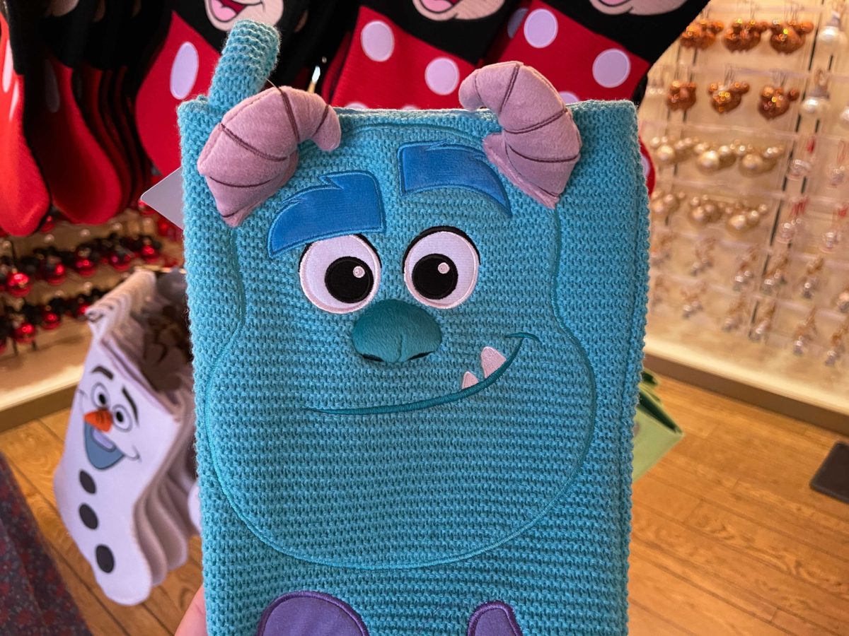 New Monsters, Inc. stockings featuring Sulley at Ye Olde Christmas Shoppe in Magic Kingdom at Walt Disney World