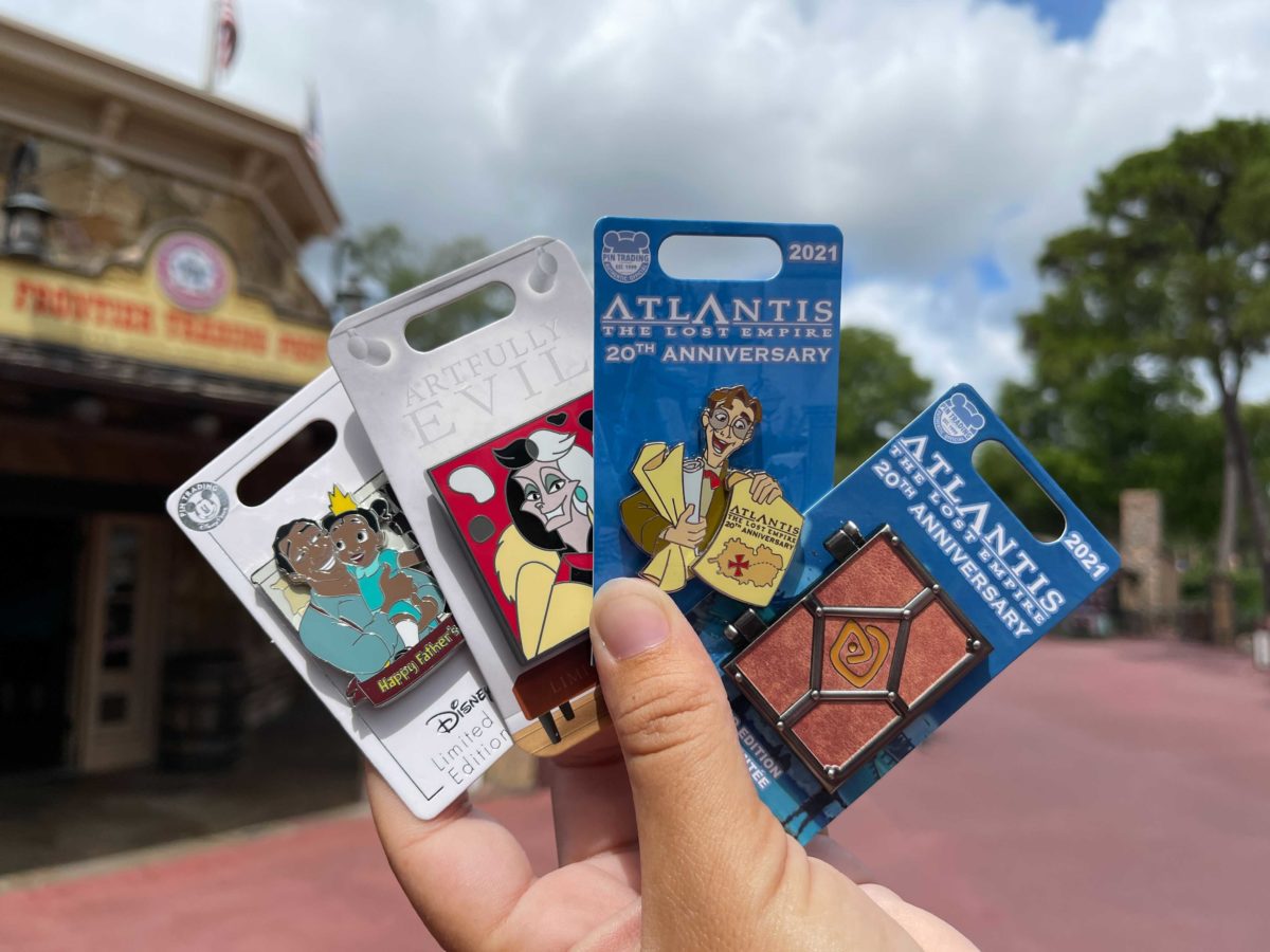 New limited edition and release Cruella, Princess and the Frog, and Atlantis: The Lost Empire pins released at Frontier Trading Post in the Magic Kingdom at Walt Disney World