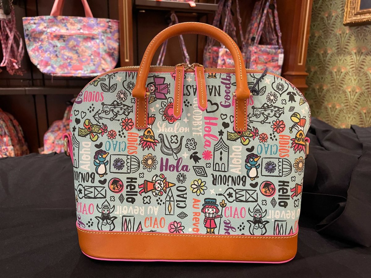 Dooney and Bourke "it's a small world" bag collection arrives at Walt Disney World