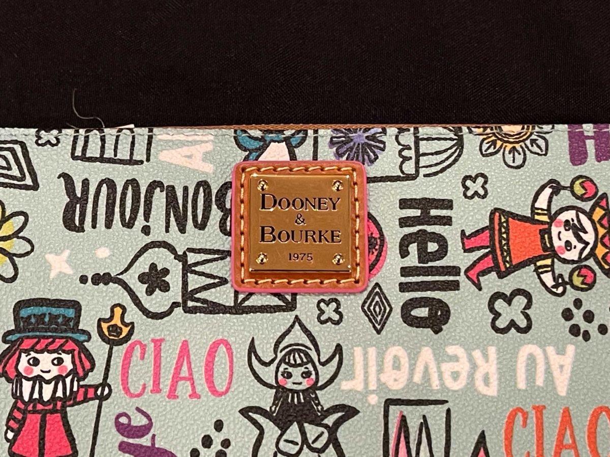 Dooney and Bourke "it's a small world" bag collection arrives at Walt Disney World