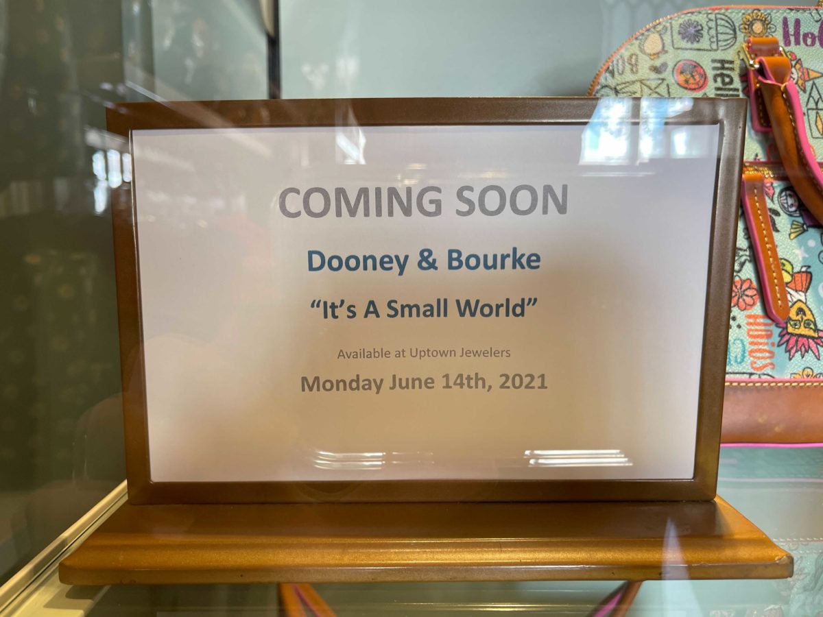 new dooney & bourke "it's a small world" collection at Uptown Jewelers in the Magic Kingdom at Walt Disney World