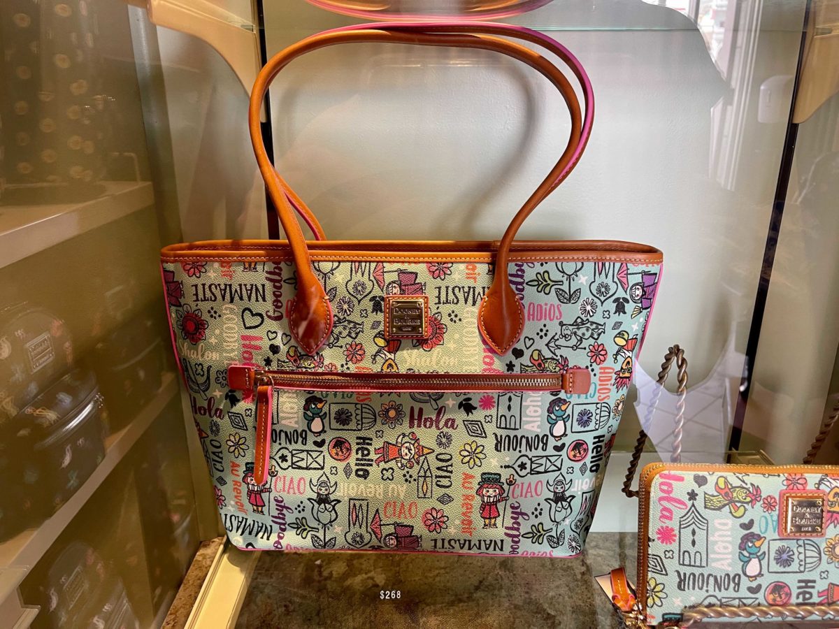 new dooney & bourke "it's a small world" collection at Uptown Jewelers in the Magic Kingdom at Walt Disney World