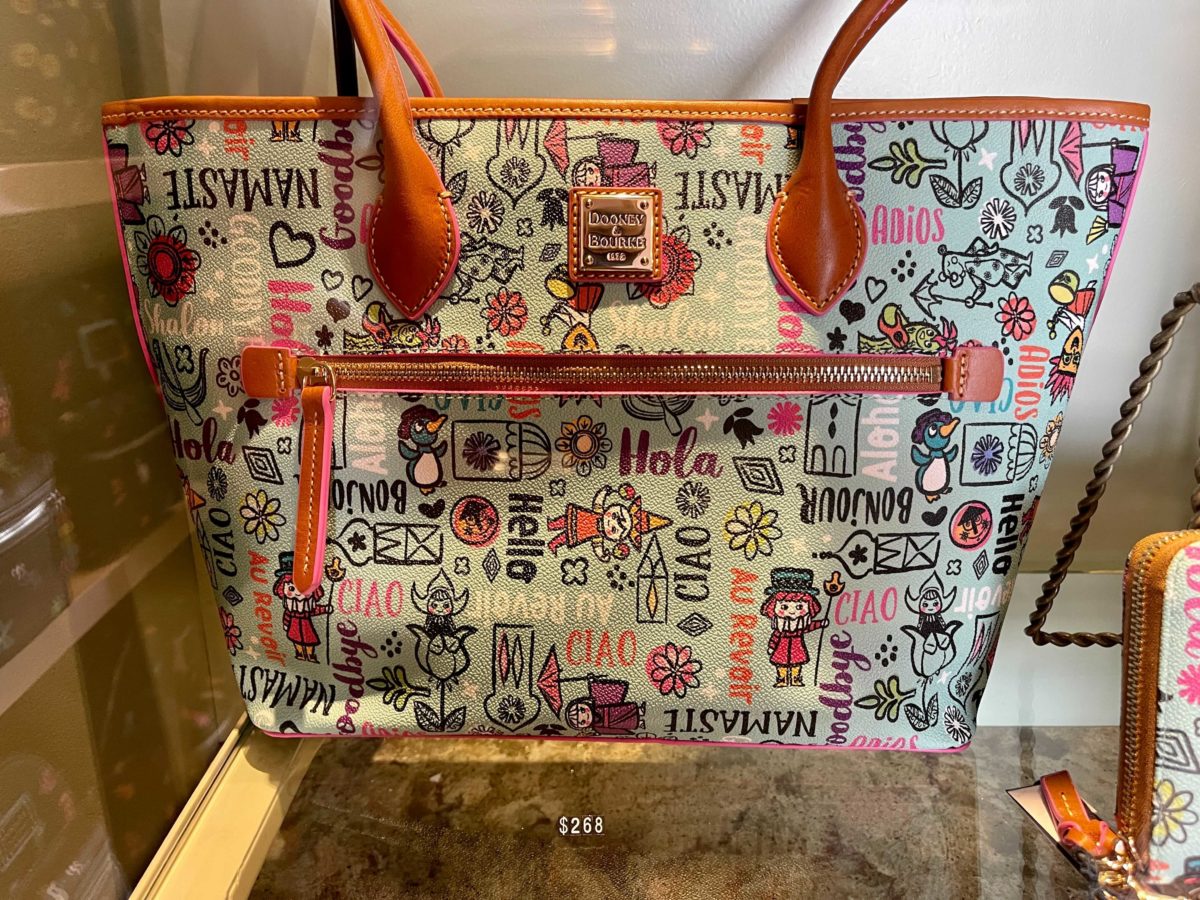 new dooney & bourke "it's a small world" collection at Uptown Jewelers in the Magic Kingdom at Walt Disney World