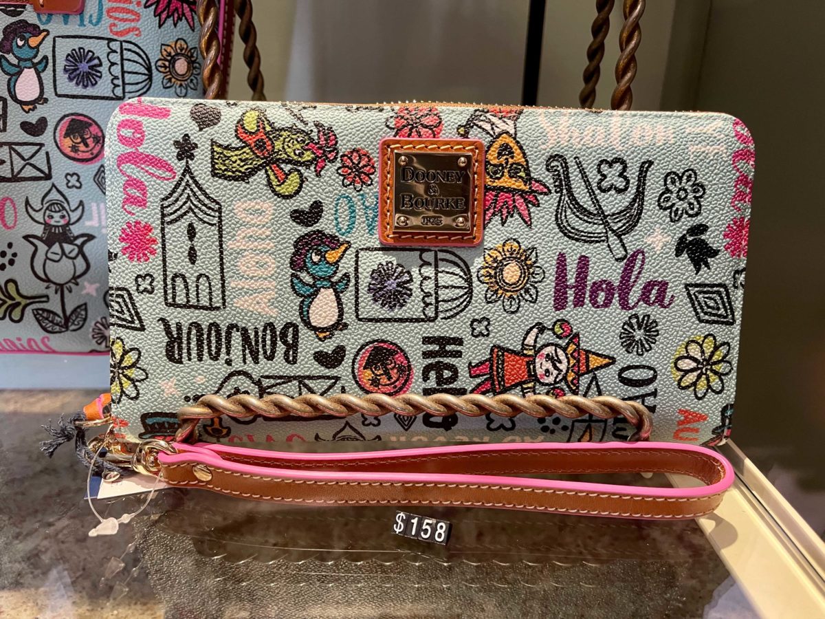 new dooney & bourke "it's a small world" collection at Uptown Jewelers in the Magic Kingdom at Walt Disney World