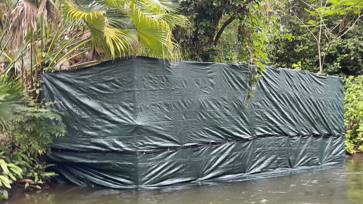A giant box covered in tarp is hiding a new scene in the Jungle Cruise at Magic Kingdom in Walt Disney World