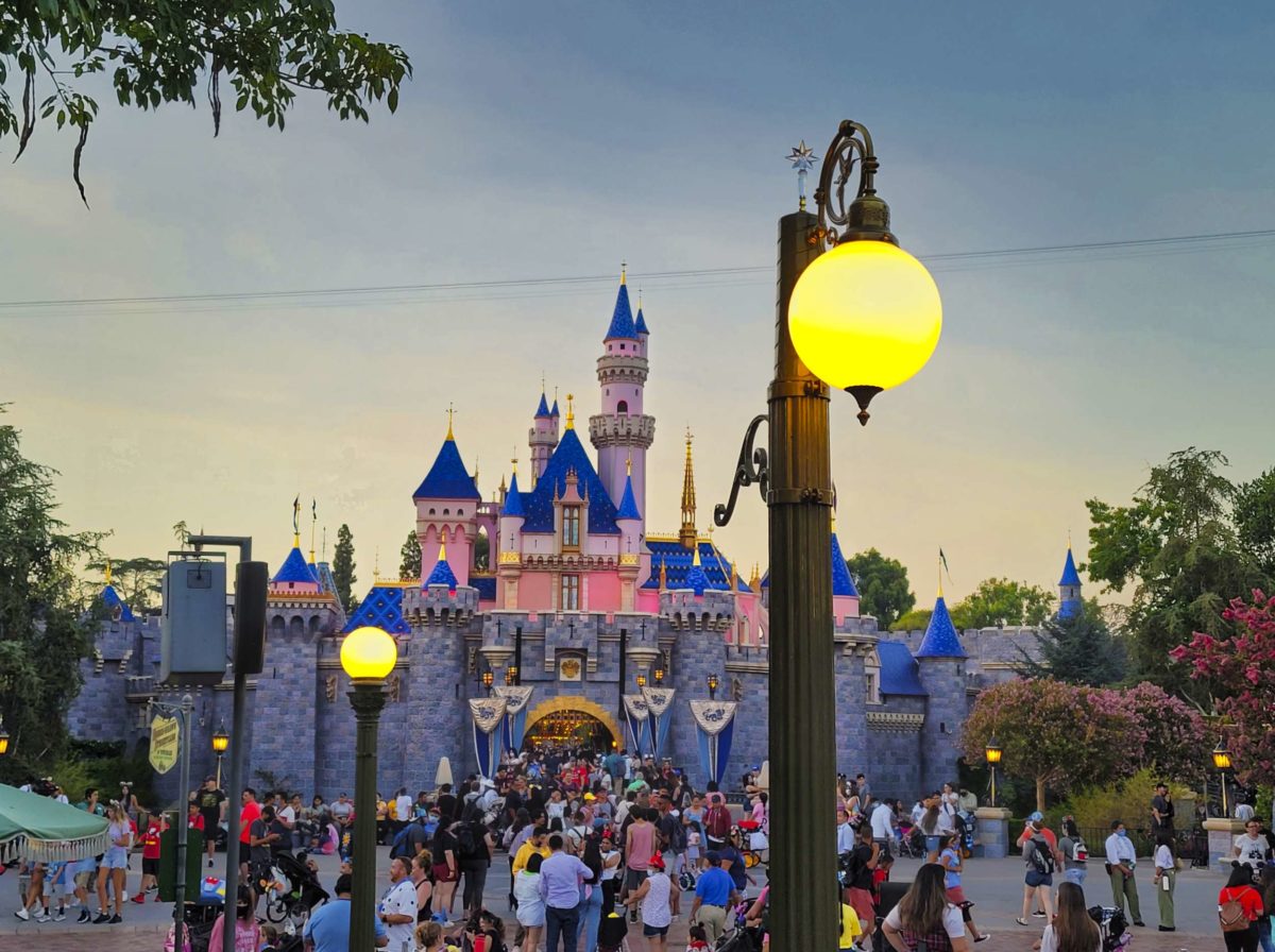 new-lights-at-hub-lit-at-dusk-with-sleeping-beauty-castle