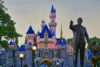sleeping-beauty-castle-and-partners-statue-at-dusk-disneyland-new-lights