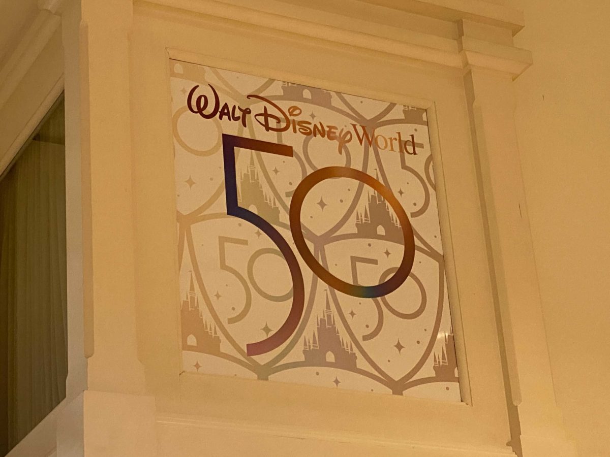 curiouser-clothiers-new-50th-logo-1452933
