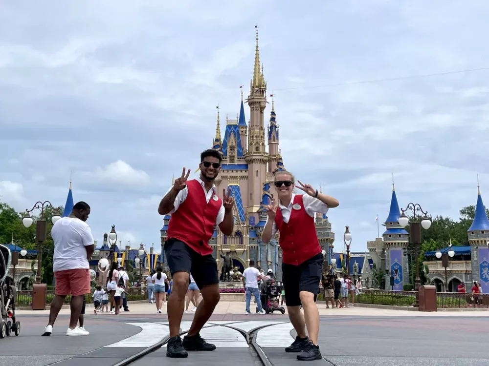 Cast Members in front of Cinderella Castle