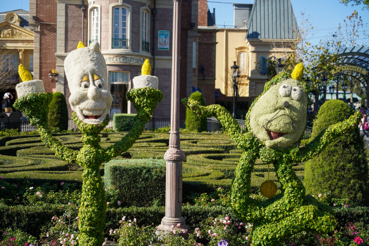 lumiere and cogsworth topiaries 4262
