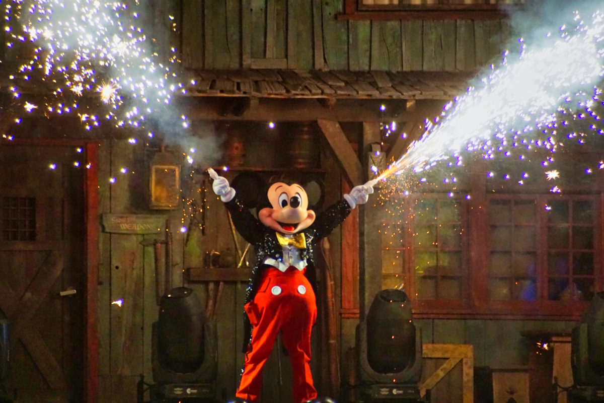 Mickey shooting fireworks in Fantasmic! at Disneyland park