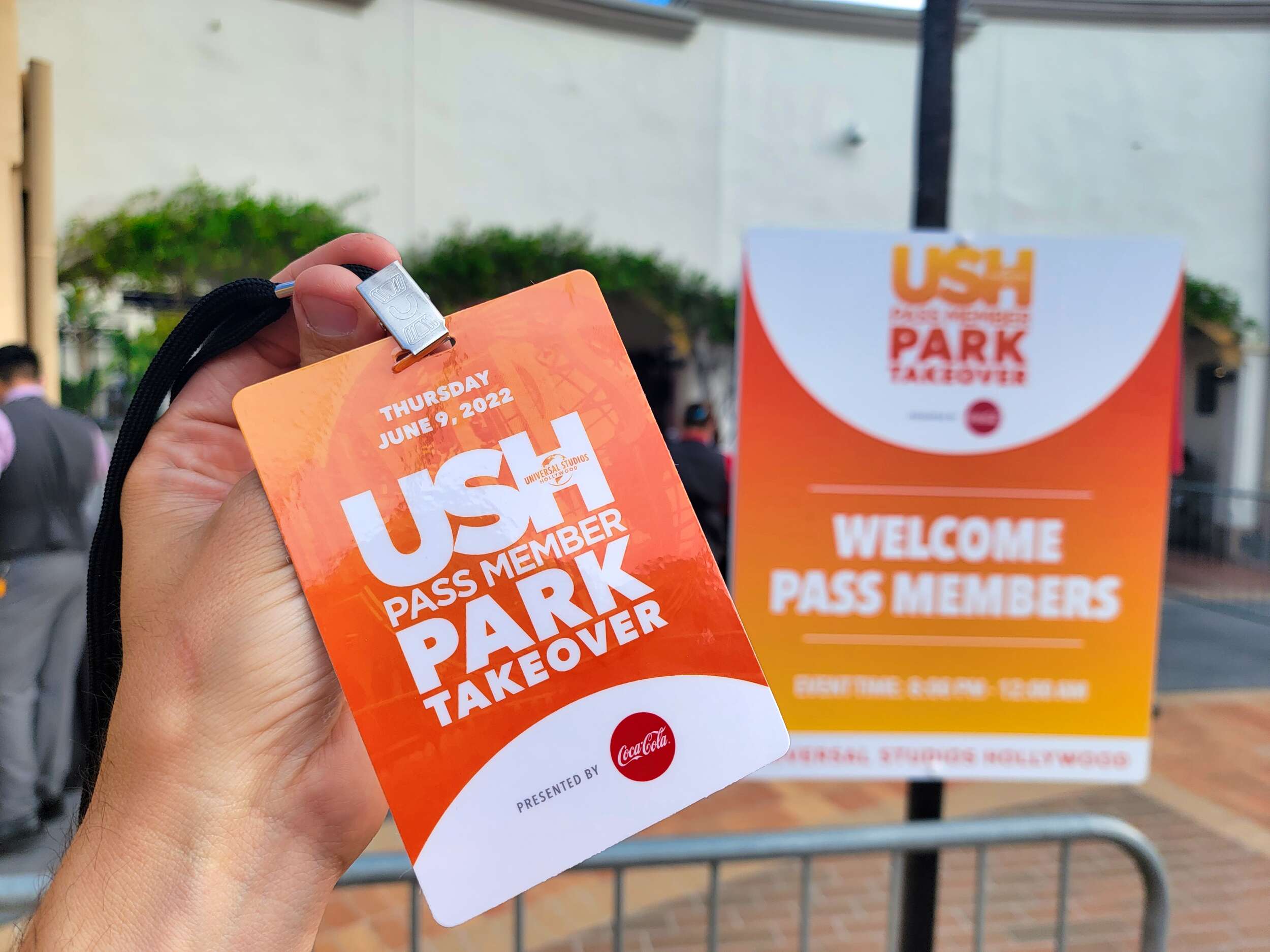USH Pass Member Park Takeover Night sign and badge