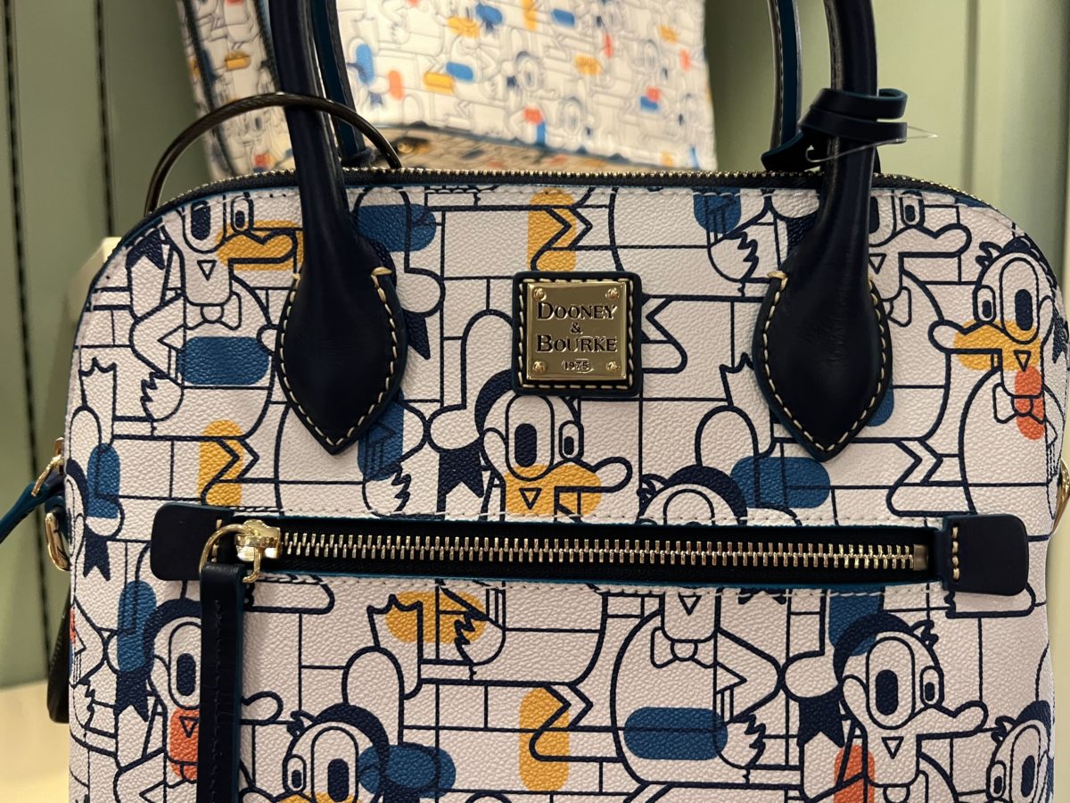 A close-up view of the Dooney & Bourke Donald Duck satchel