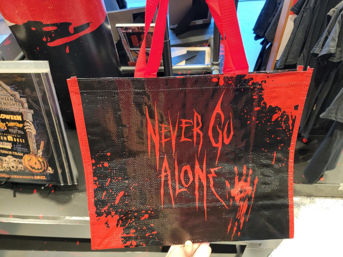 never go alone reusable tote bag ush 2