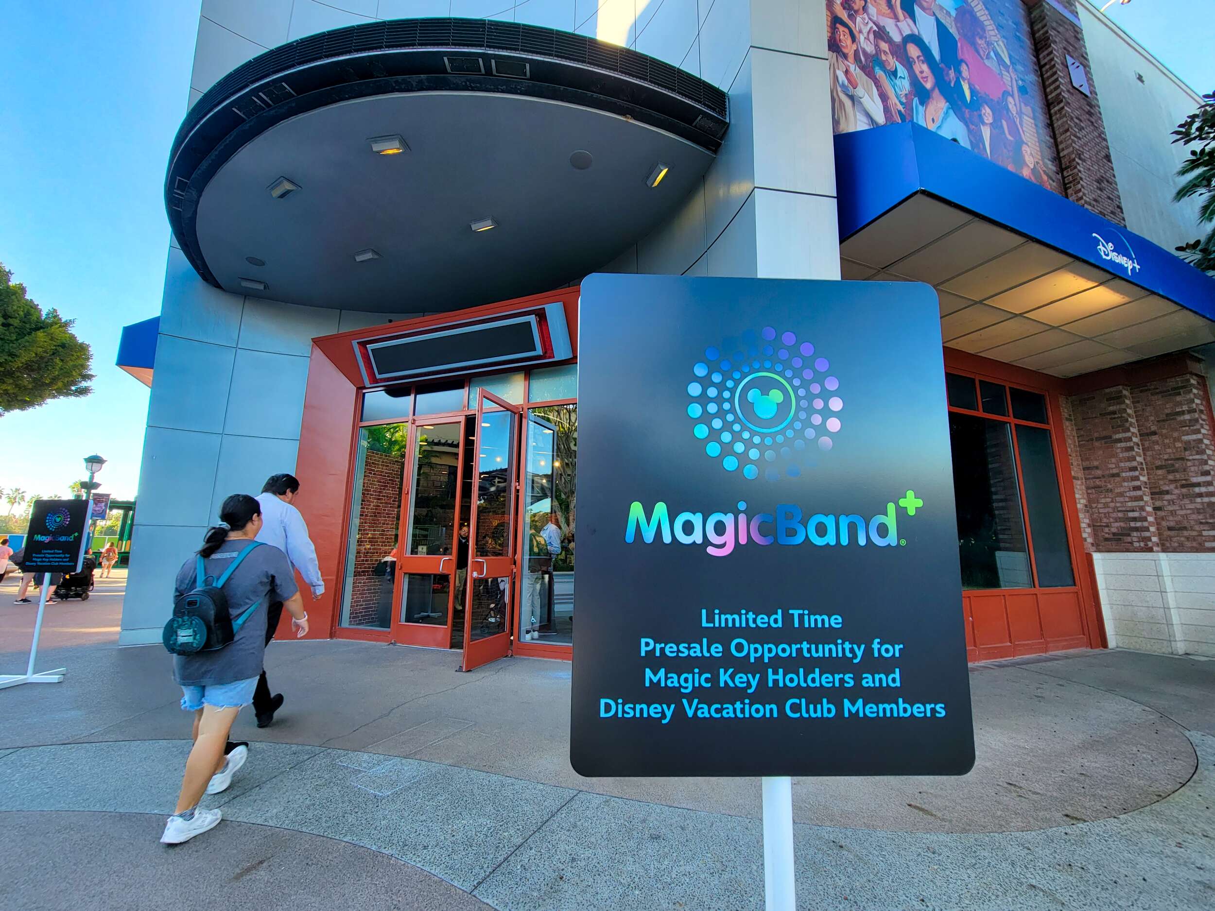 A guest enters the former ESPN Zone to purchase a MagicBand +.