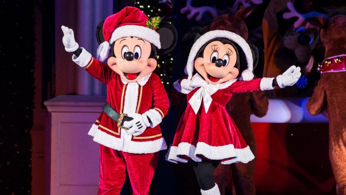 Mickey and Minnie in Santa Costumes featured