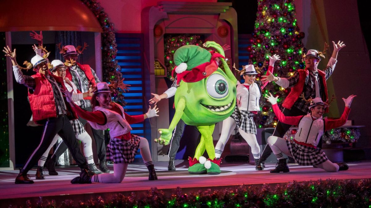 Tomorrowland dance party with Mike Wazowski at Mickey's Very Merry Christmas Party