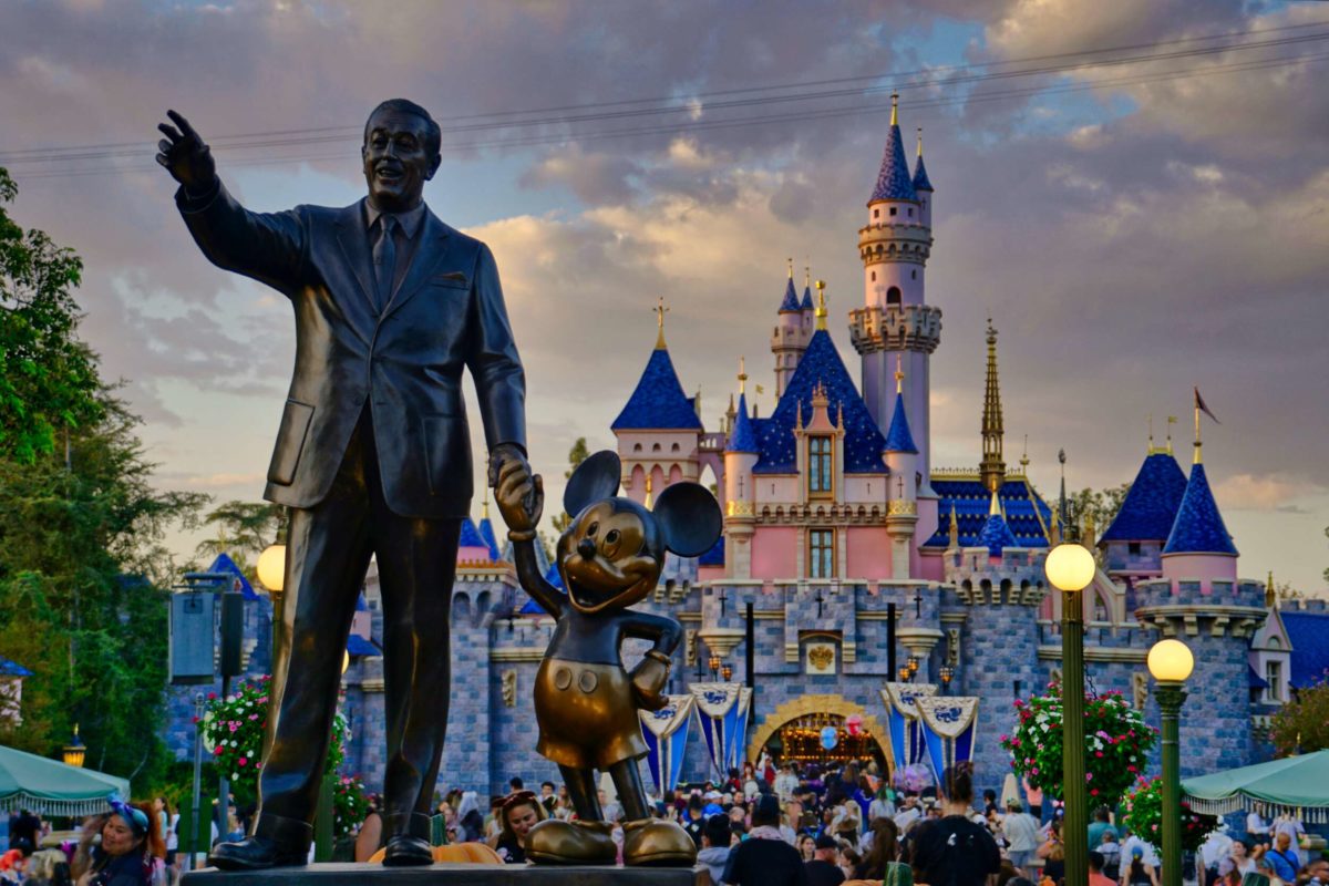 Sleeping Beauty Castle at Sunset Disneyland with Partners statue Stock