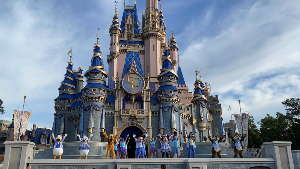 Let the Magic Begin stage show in front of Cinderella Castle with 50th anniversary decorations