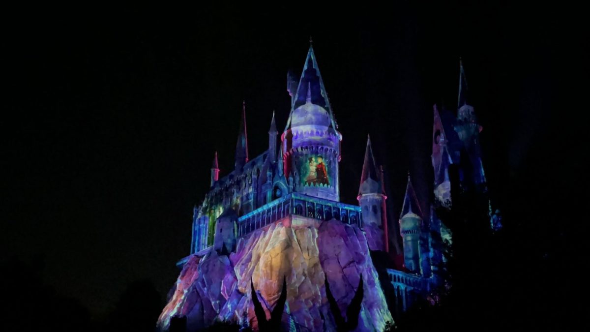 Magic of Christmas at Hogwarts Castle: Hermione and Krum dancing on tower