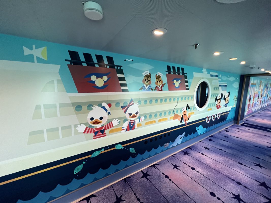 Disney Wish Oceaneer Club hallway murals 3065