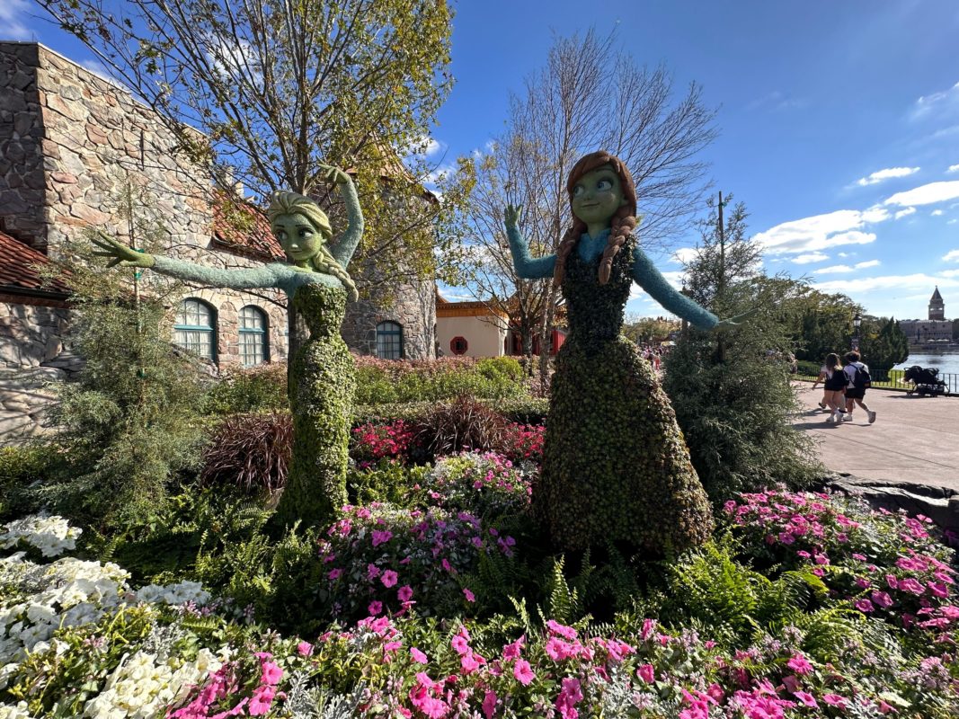 Anna and Elsa character topiaries in front of the Norway Pavilion.