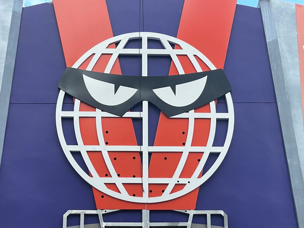 villain con sign globe eyes