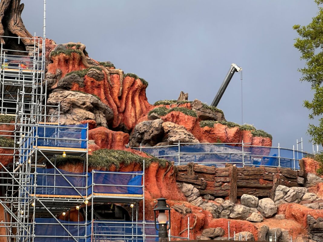 Splash Mountain construction scaffolding and materials are easily visible from park walkways.