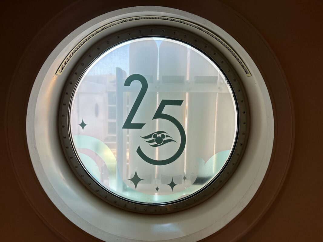 New decorations were spotted aboard The Disney Wish for the Silver Anniversary at Sea at Disney Cruise Line.