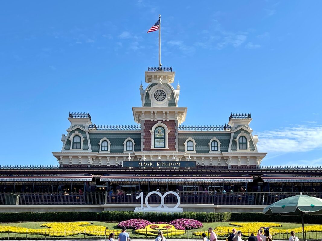 Magic Kingdom main street u.s.a. train station disney100 sign stock