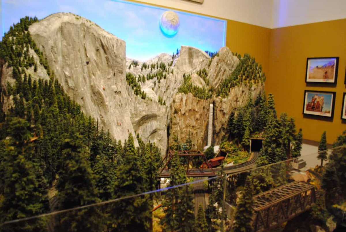 This fanciful layout pays tribute to Ward Kimball’s Grizzly Flats Railroad. It includes a Hobo Camp from which is heard a plaintiff solo harmonica contributed by musician Neil Young - himself a devout miniature railroad fan.